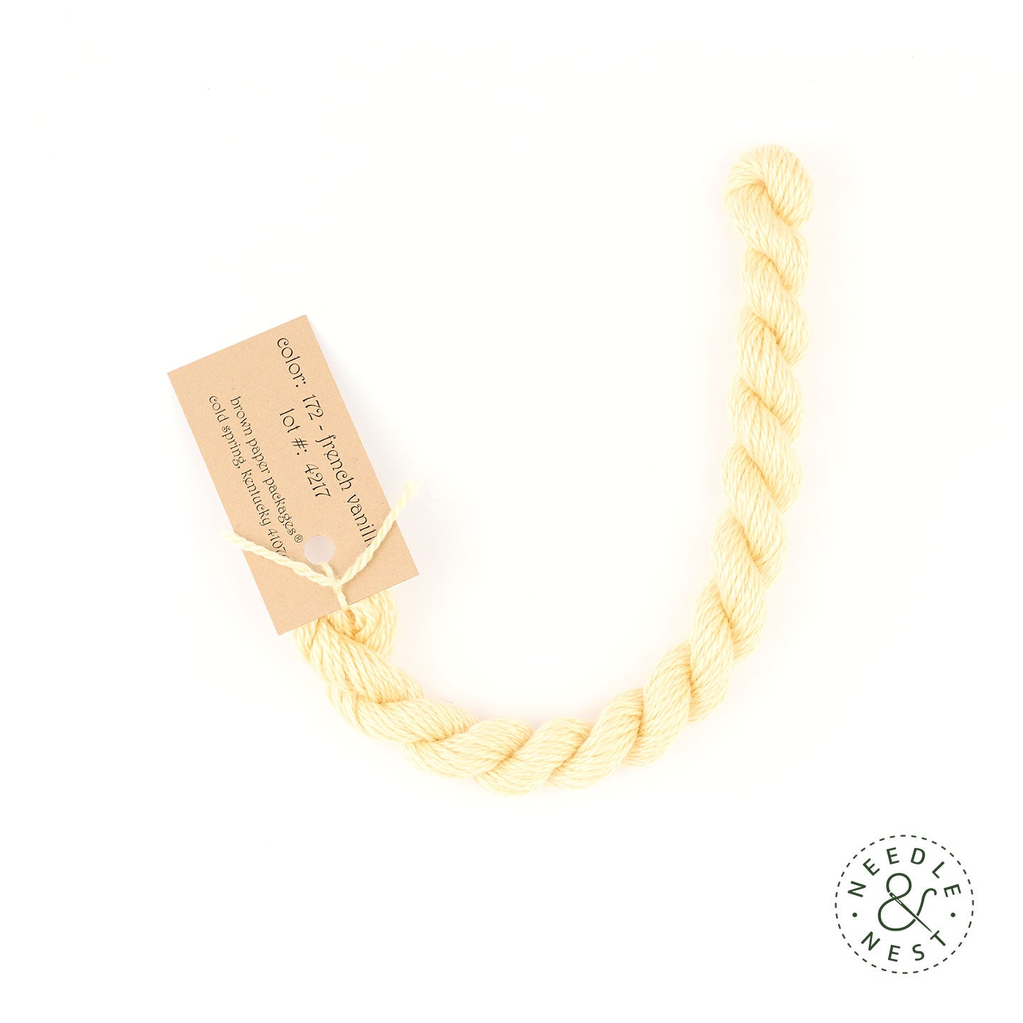 Silk & Ivory French Vanilla Thread on a White Background