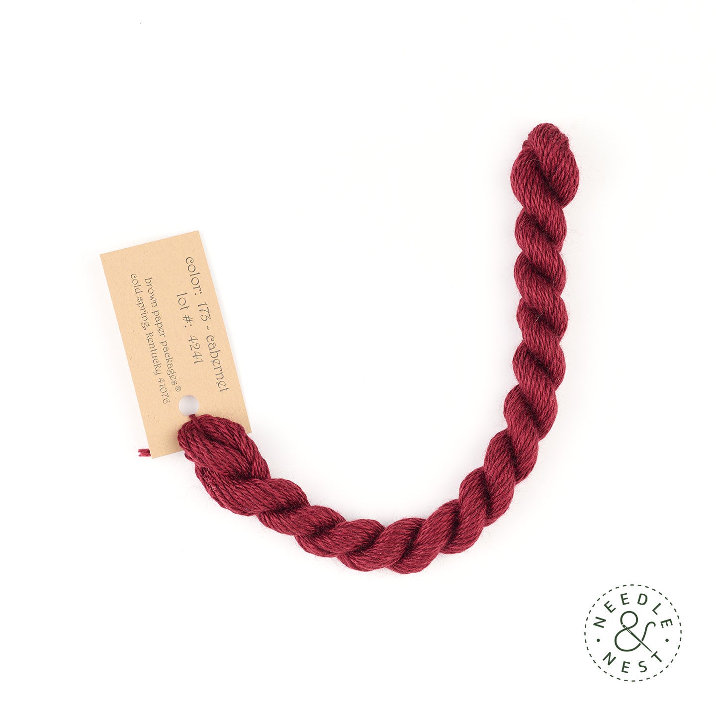 Silk & Ivory Cabernet Thread on a White Background