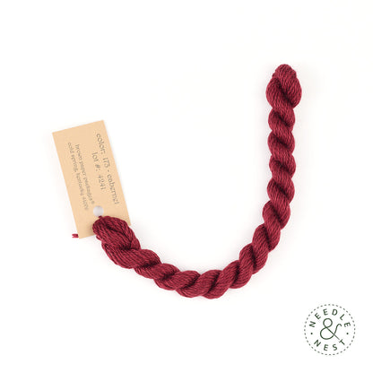 Silk & Ivory Cabernet Thread on a White Background