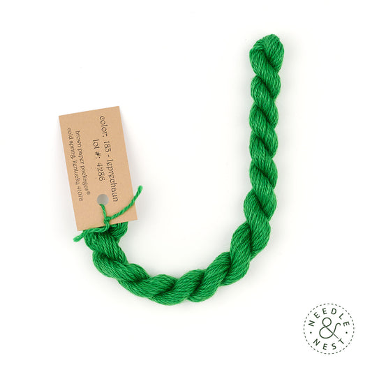 Silk & Ivory Leprechaun Thread on a White Background