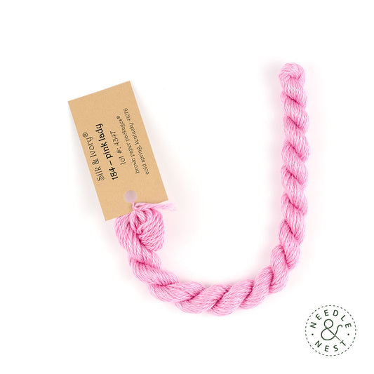 Silk & Ivory Pink Lady Thread on a White Background