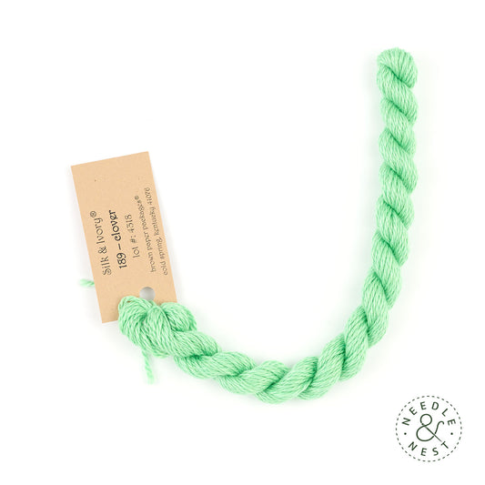 Silk & Ivory Clover Thread on a White Background