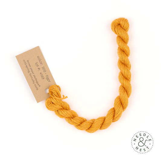 Silk & Ivory Tiger Thread on a White Background
