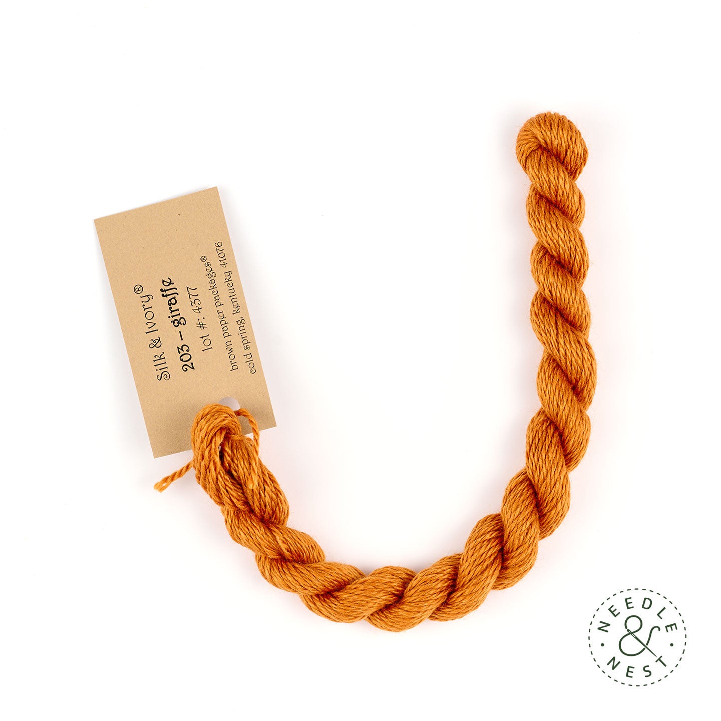 Silk & Ivory Giraffe Thread on a White Background