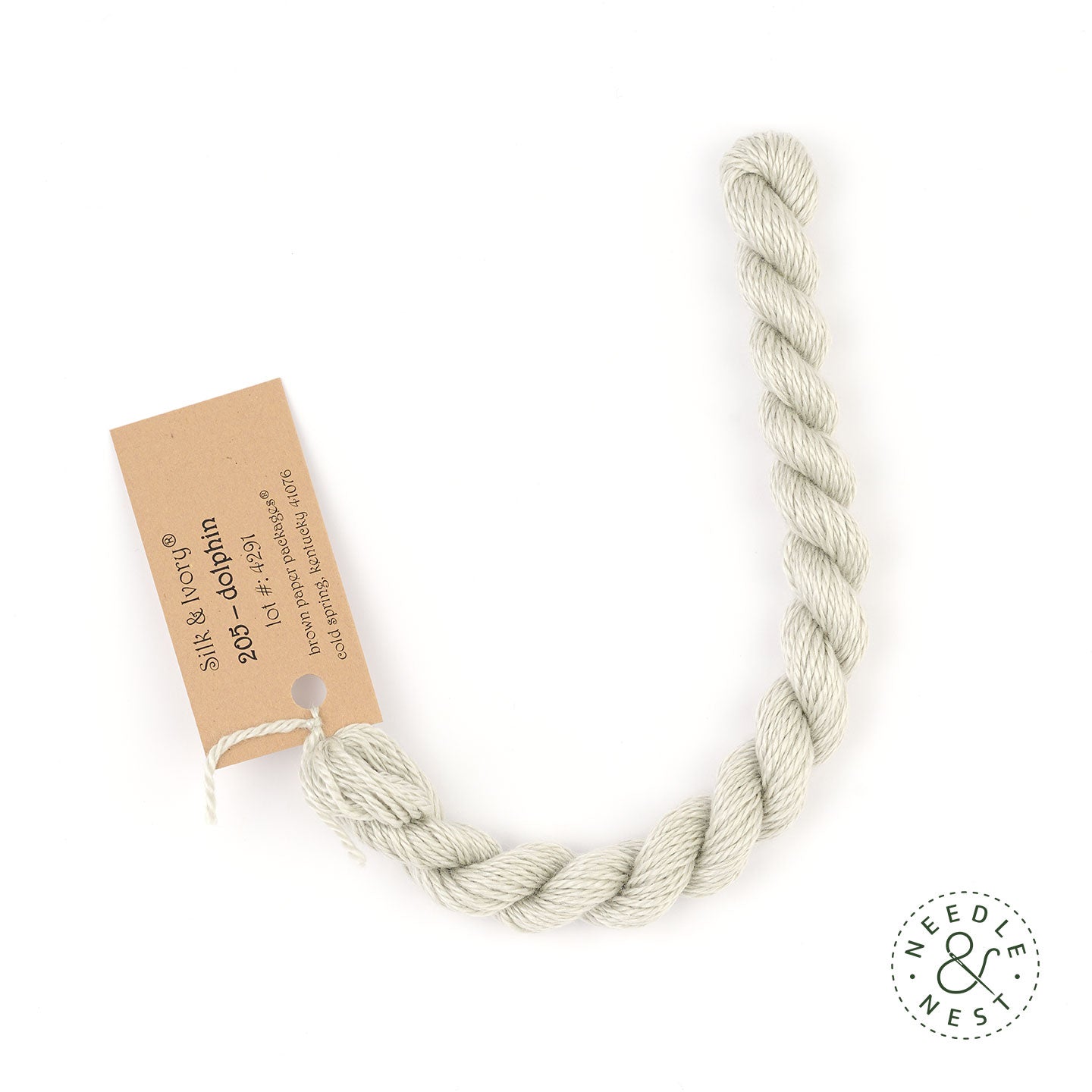 Silk & Ivory Dolphin Thread on a White Background