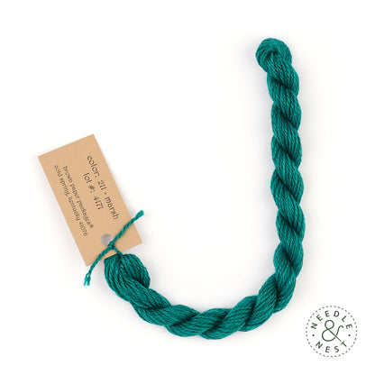 Silk & Ivory Marsh Thread on a White Background