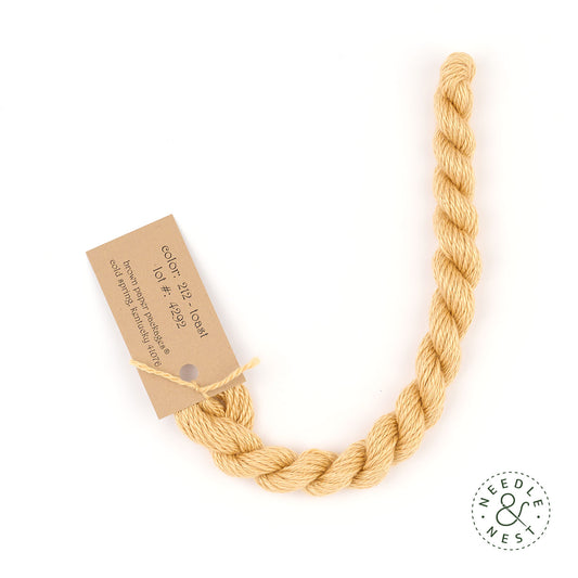 Silk & Ivory Toast Thread on a White Background