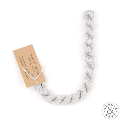 Silk & Ivory Pewter Thread on a White Background
