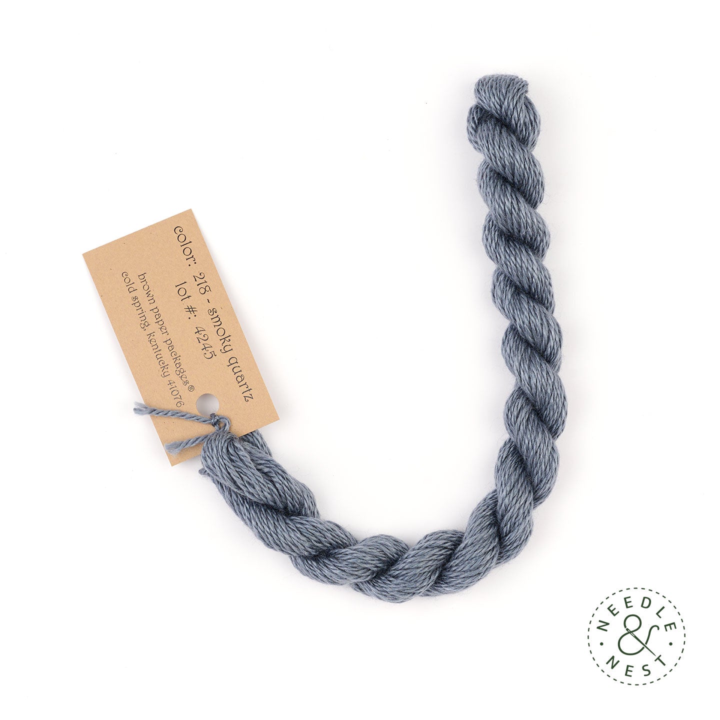 Silk & Ivory Smoky Quartz Thread on a White Background