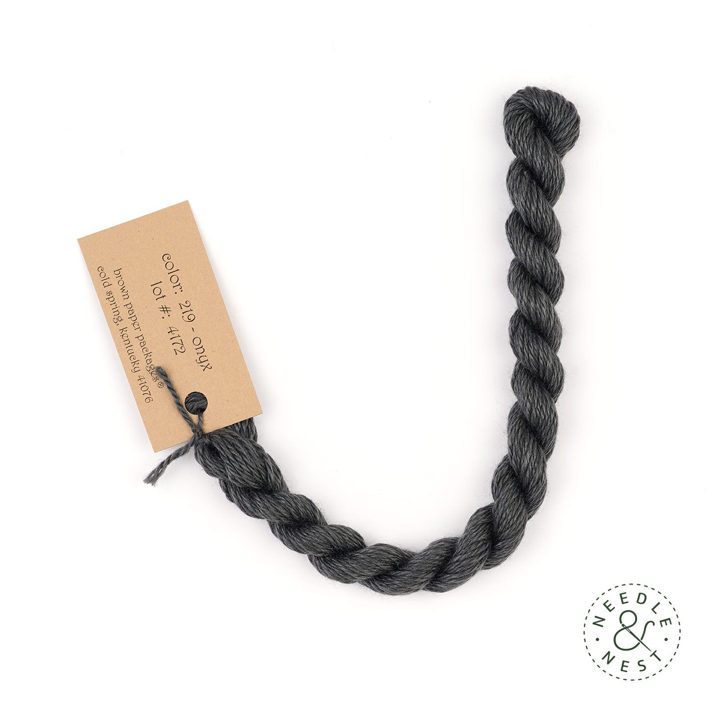 Silk & Ivory Onyx Thread on a White Background