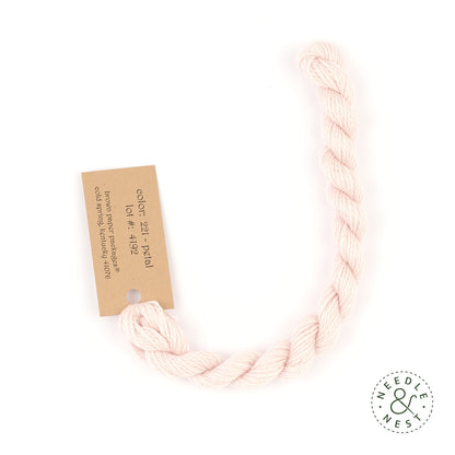 Silk & Ivory Petal Thread on a White Background