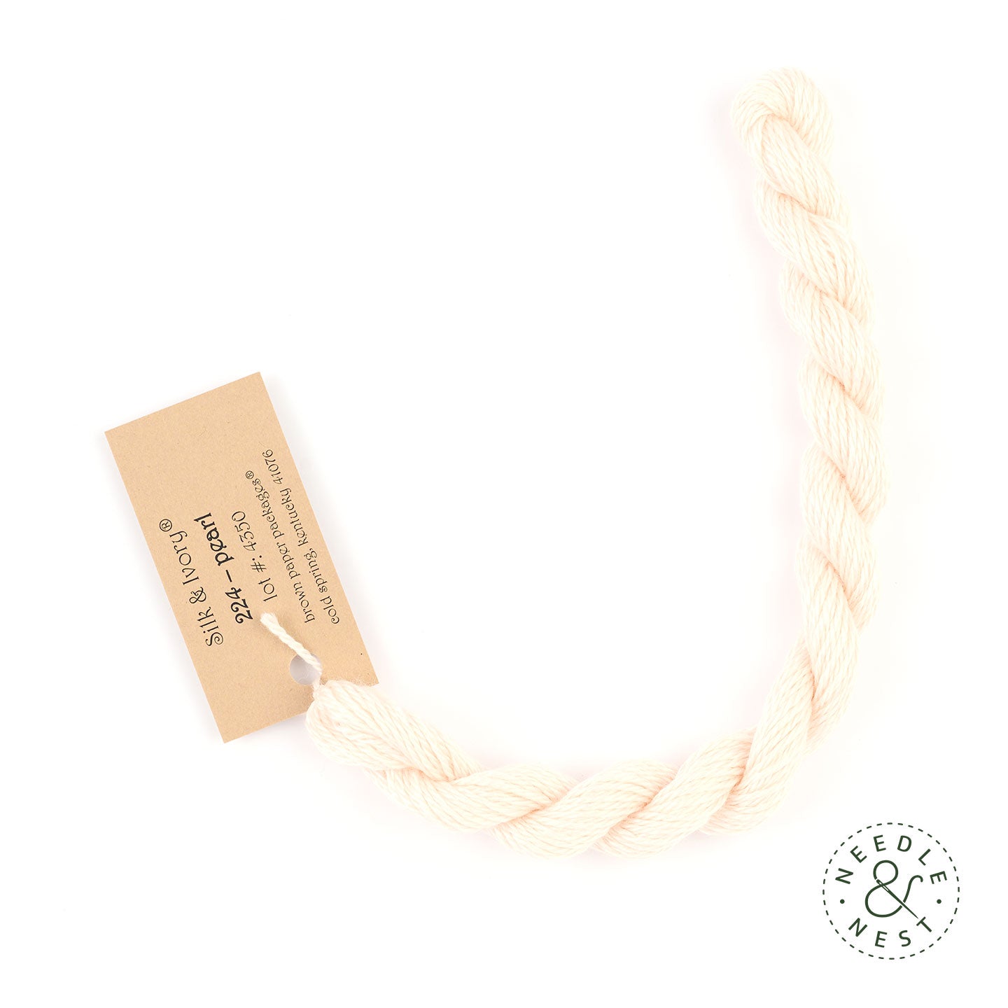 Silk & Ivory Pearl Thread on a White Background