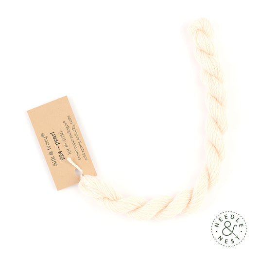 Silk & Ivory Pearl Thread on a White Background