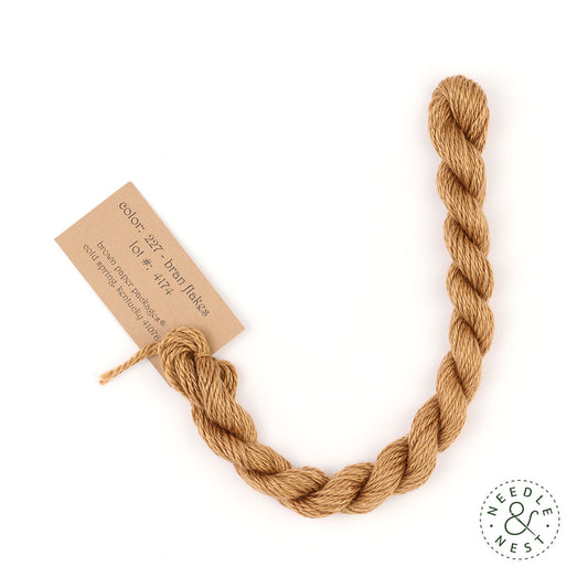 Silk & Ivory Bran Flakes Thread on a White Background