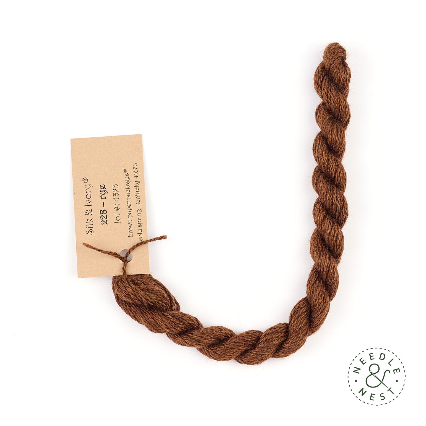 Silk & Ivory Rye Thread on a White Background