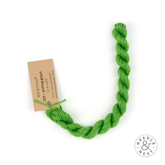 Silk & Ivory Putting Green Thread on a White Background