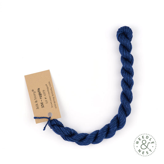 Silk & Ivory Regatta Thread on a White Background