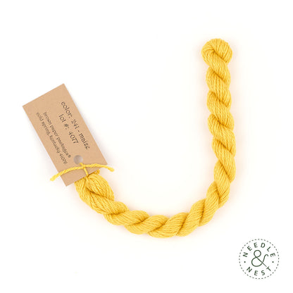 Silk & Ivory Maize Thread on a White Background