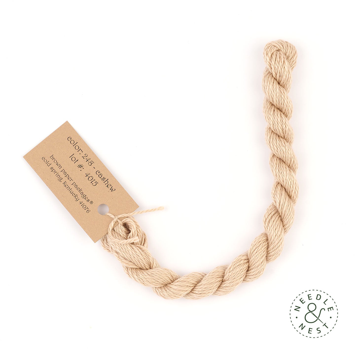Silk & Ivory Cashew Thread on a White Background