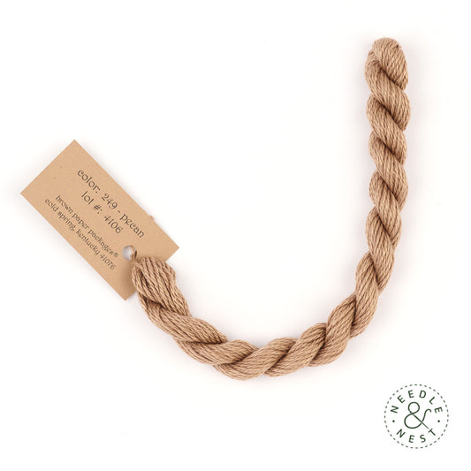 Silk & Ivory Pecan Thread on a White Background