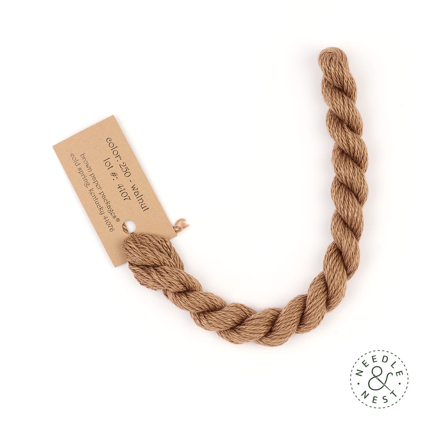 Silk & Ivory Walnut Thread on a White Background